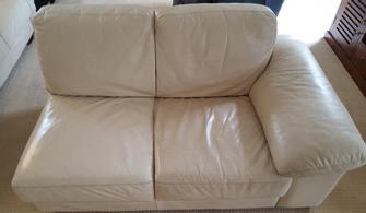 Leather Lounge Suite Cleaning, Clayfield, Brisbane - Halfway through cleaning a cream leather lounge suite in Clayfield, Brisbane. Look how much brighter the left hand side is.