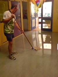 Vinyl floors - The first of 3 coats of sealer is being applied to give a bright clean look at this day care centre.

The sealer makes it easier to mop and keep clean. Without the sealer the vinyl absorbs dirt and never looks clean.