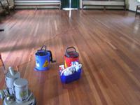 Timber floors before treatment - As you can see in this before shot, the timber has lost its shine and looks very dull.