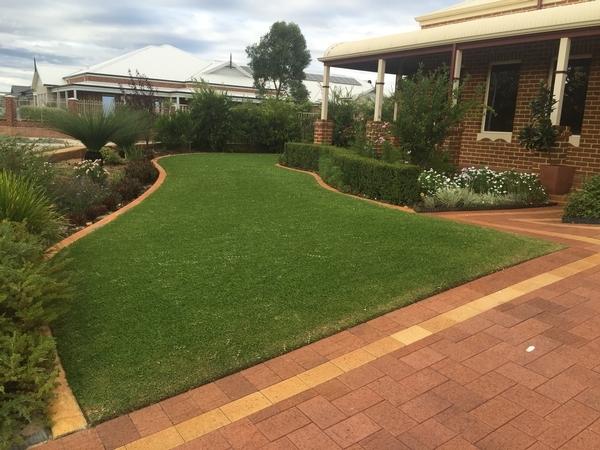 Lawn mowing & edging. The Vines