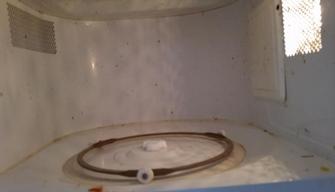 Microwave clean, included in kitchen clean. BEFORE