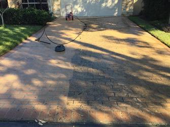 High Pressure Cleaning - before and after - This paved driveway was looking pretty filthy but look at how much better it comes up after I&#39;ve used the high pressure cleaner on it. This client was very happy with the end result.&nbsp;