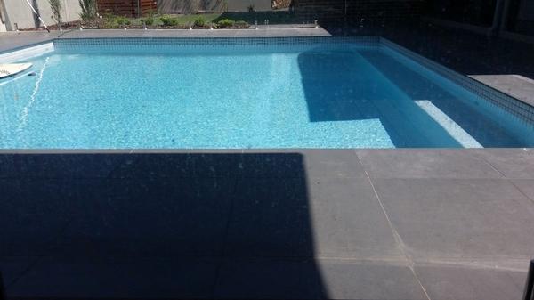 Before Cleaning Swimming Pool Glass Panels